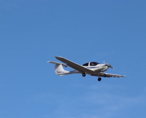 Learning to fly in the UK. General Aviation plane in flight.