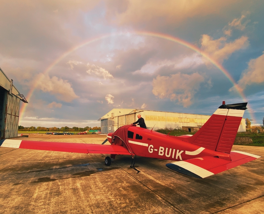 Piper PA-28 Warrier Piper PA-28 under a rainbow